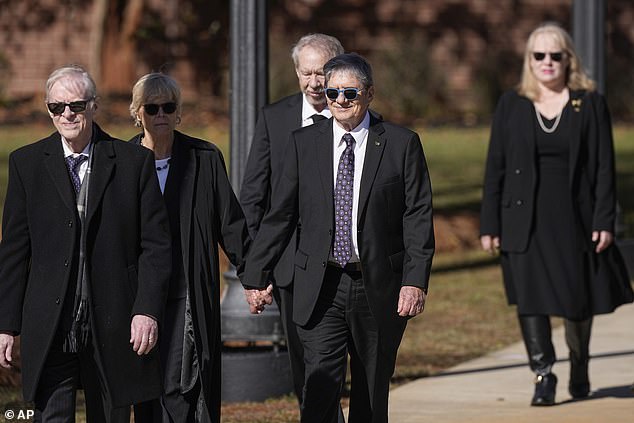 All four of Jimmy and Rosalynn Carter's children attended services in the former first lady's honor at Americus and Monday in Atlanta, Georgia.  From left: Jack Carter, James “Chip” Carter, Jeff Carter and Amy Carter