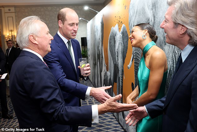 William and Charlie Mayhew OBE - founder and CEO of Tusk - shake hands with Emma Weymouth and her husband Ceawlin Thynn