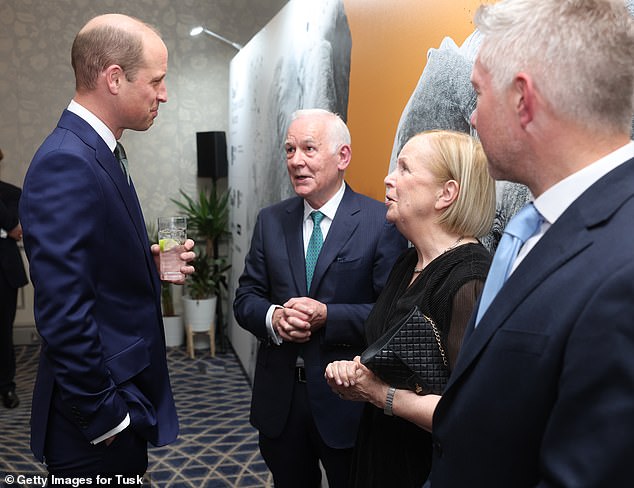 The group seemed to enjoy each other's company as they enjoyed a chat at the awards ceremony