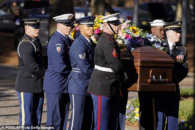 After arriving in Atlanta, members of each branch of the military carried Rosalynn's casket to the Jimmy Carter Presidential Library and Museum.