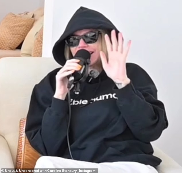 Footage shared by the podcast on their Instagram last week shows her covering her face with huge sunglasses while wearing her hood and the microphone in front of her