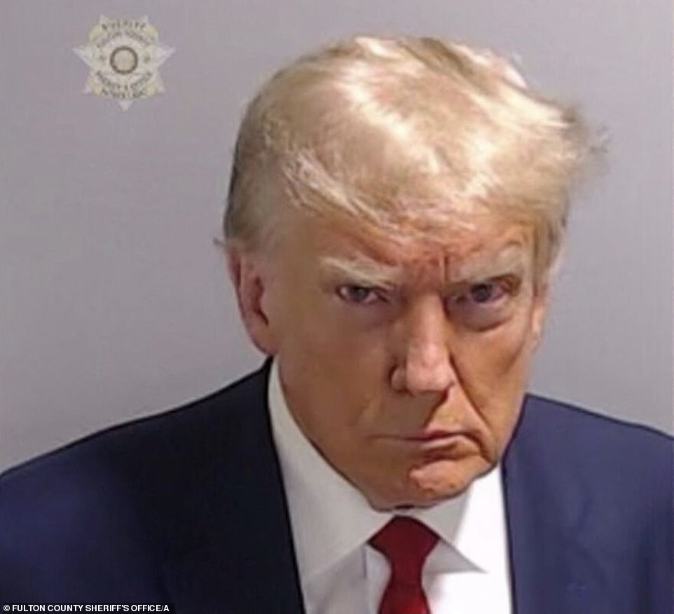 1701134173 969 Trump unveils Christmas themed wrapping paper with his mugshot