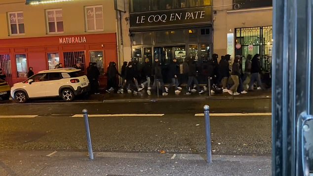 Newcastle United's Supporters' Club cited a video showing a large group of hooded PSG fans in black clothing 'looking for' Newcastle fans scattered across the city