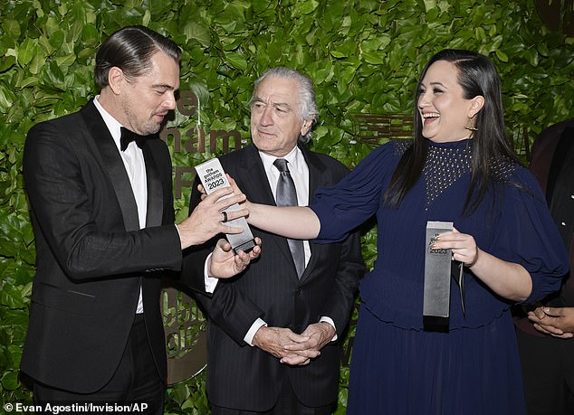 An honor: DiCaprio, De Niro and Gladstone posed with Gotham's historic icon and paid tribute to the creator of Killers of the Flower Moon