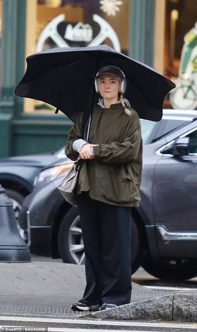 The Royals hitmaker showed off her natural beauty as she stepped out in the pouring rain with her brand new platinum haircut