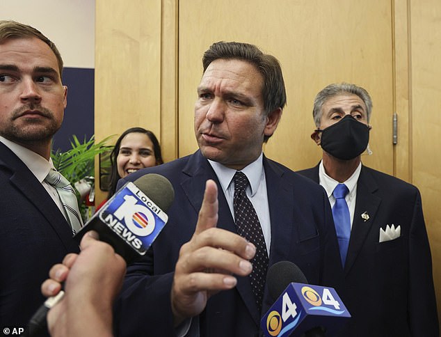 “In Florida, girls will play girls' sports and boys will play boys' sports,” Governor Ron DeSantis said as he signed the bill (file photo)