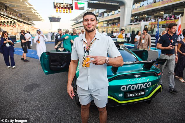 The fast life: It comes as Tommy lived it up in the UAE, partied with Chris Brown and attended the F1 Grand Prix (pictured)