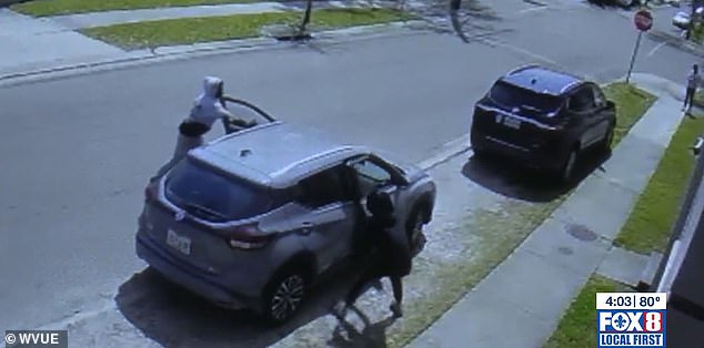 Surveillance footage showed the teens getting into Frickey's gray SUV before her arm got caught in the seat belt and she was dragged down the block.