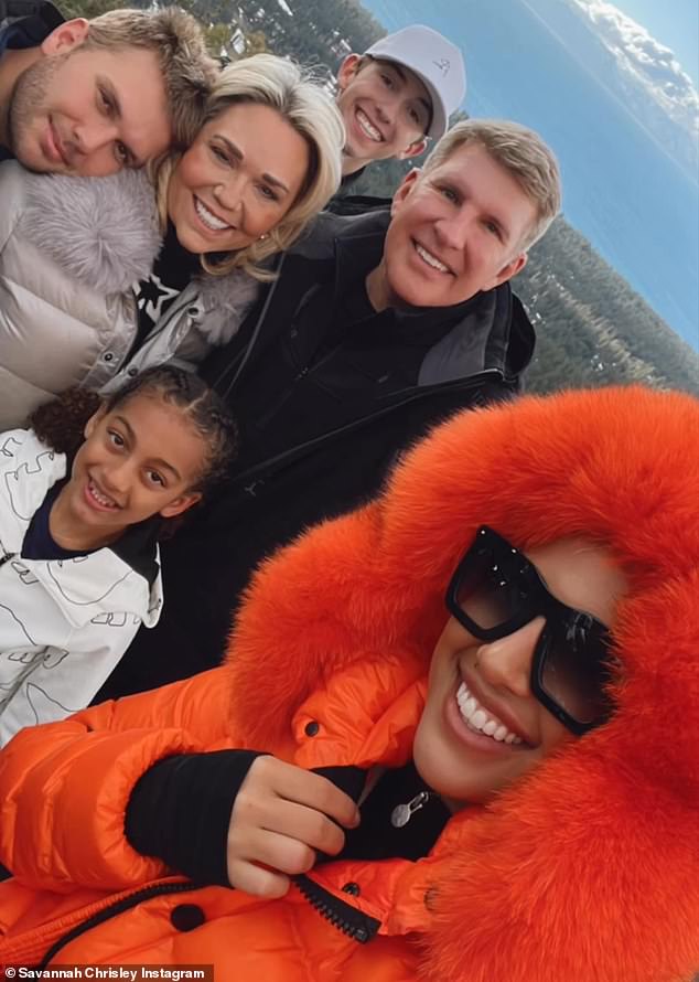 Todd and Julie pictured with Savannah and her niece Chloe and brother Grayson, both of whom she is guardian