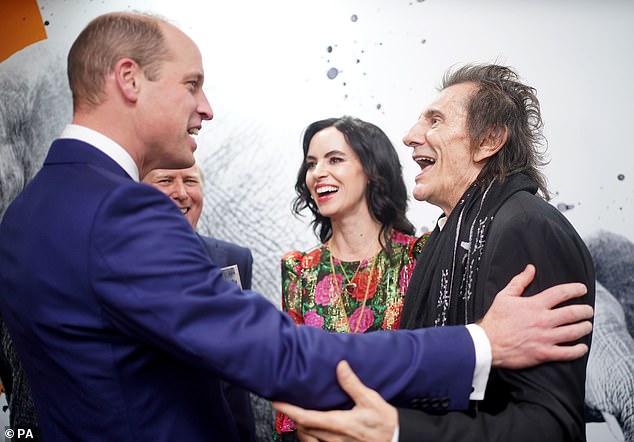 The Prince of Wales (left) speaks to Sally and Ronnie Wood at the 11th annual Tusk Conservation Awards at the Savoy Hotel