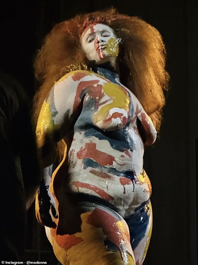 Rocco painted American model Lynley Eilers wearing an extravagant, long and bushy ginger wig