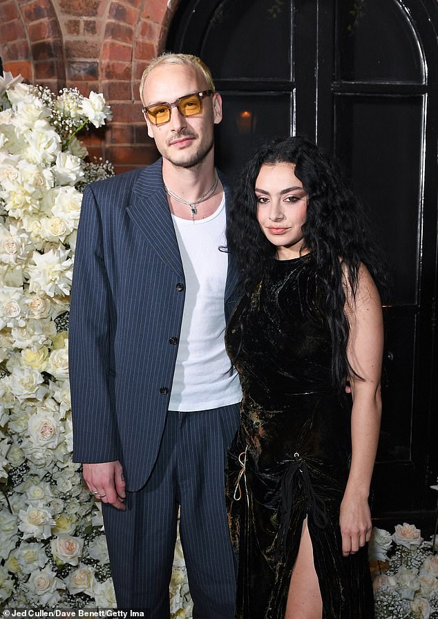 Couple: Charli, 31, and George, 33, are believed to have started dating in March 2022 (pictured in May this year)