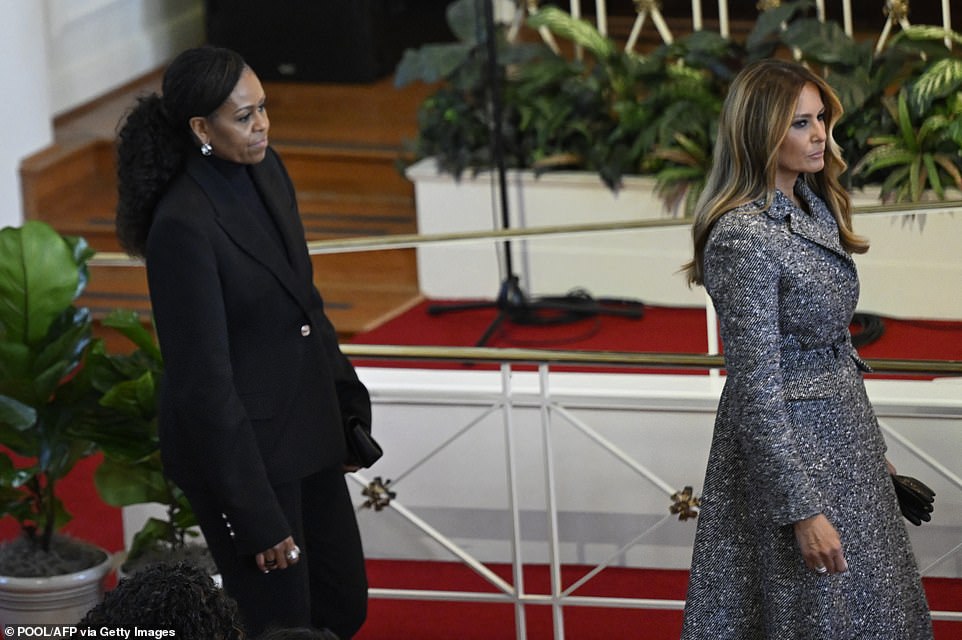 In perhaps the clearest example of unity, Melania Trump and Michelle Obama sat next to each other, inches apart, disregarding the animosity caused by their spouses' presidencies.  It was a rare public appearance by Mrs. Trump, who has stayed out of the spotlight as her husband pursues a third step in the White House.
