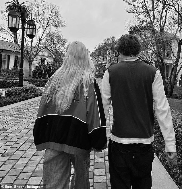 He also occasionally appeared on her Instagram feed and earlier this year Sami shared an adorable black and white photo taken from behind the pair as they held hands.