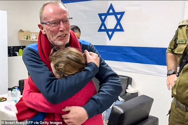 This is the moving moment when Emily is reunited with her father after 50 days in captivity