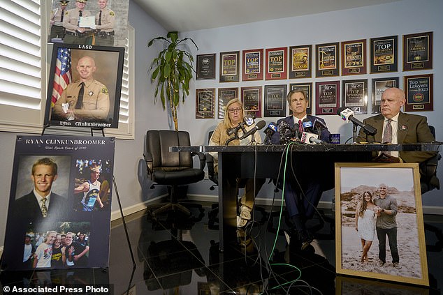 Attorney Bradley Gage, center, and Kim and Mike Clinkunbroomer, parents of the late Los Angeles Deputy Sheriff Ryan Clinkunbroomer