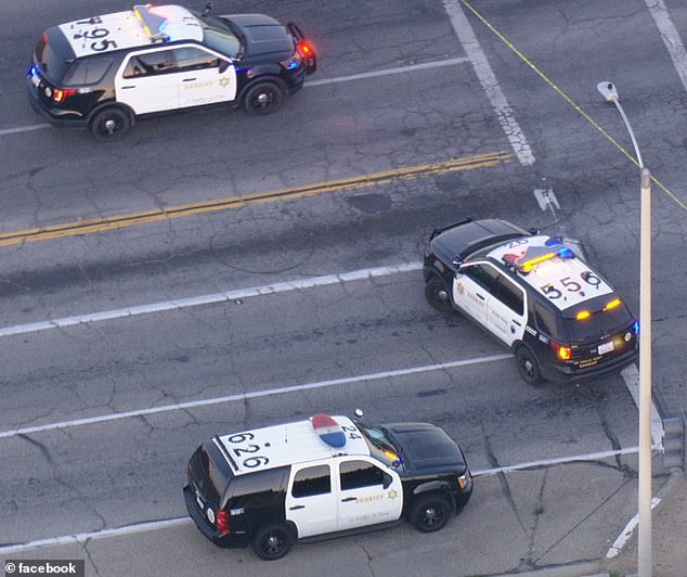 The sheriff's deputy was sitting in his patrol car at a red light when he was ambushed