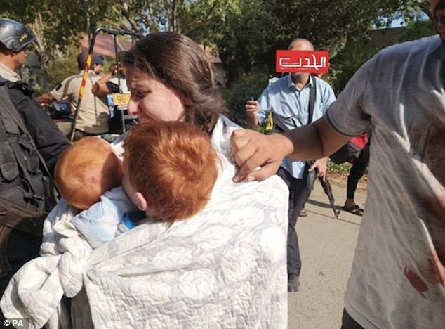 The image of the two young boys being carried by their weeping mother, Shiri, as they were marched from their homes was one of the most striking published in the early days of the war between Israel and Hamas.  It was hoped they would be released this evening