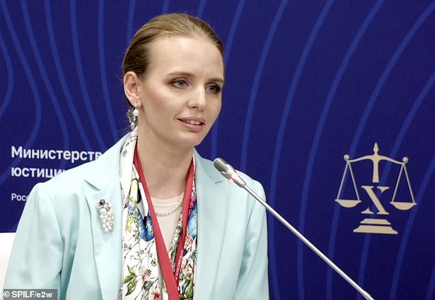 Maria Vorontsova, 37, pictured leading a debate on genetics and law at the 10th International Legal Forum in St. Petersburg