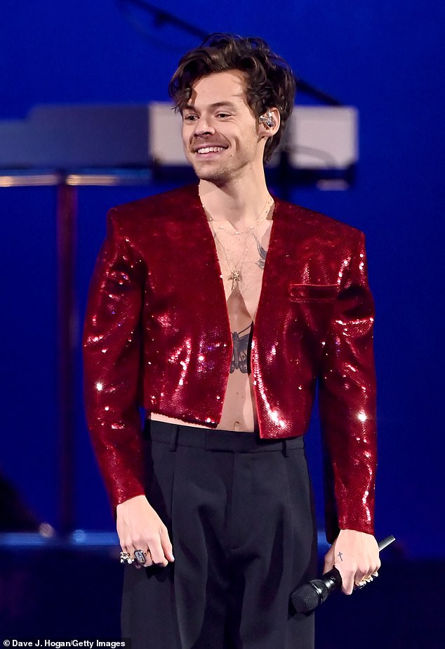 Harry Styles' As It Was (pictured) remained in the top ten most-streamed songs worldwide, dropping from number one in 2022 to third this year