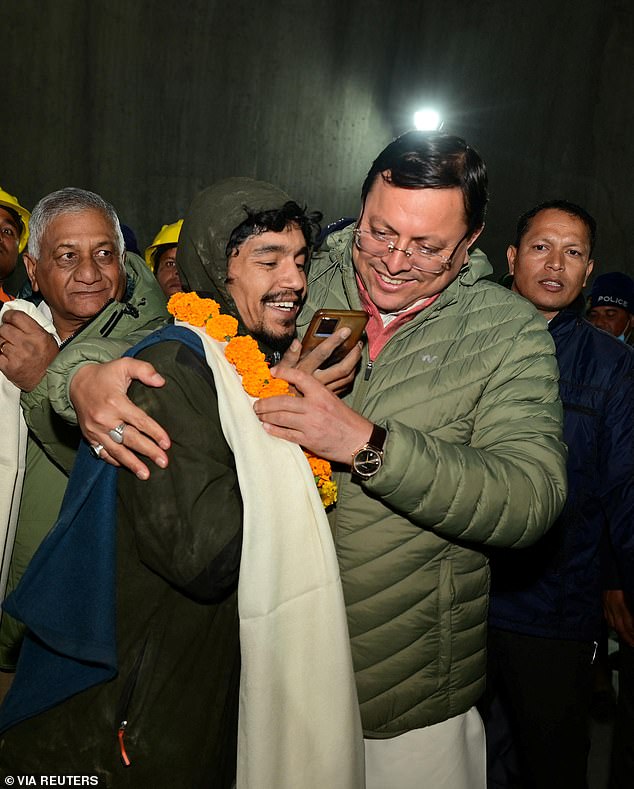 The men received garlands of flowers in honor of their miraculous escape from the tunnel