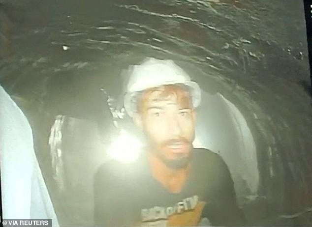 One of the workers trapped in a tunnel is seen after part of the tunnel collapsed in Uttarkashi in the northern state of Uttarakhand, India, November 21, 2023