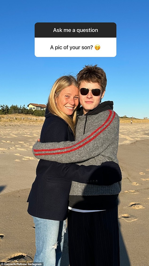 She also posed with son Moses on the beach