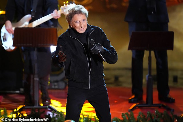 Barry Manilow performs at the Rockefeller Center Christmas tree lighting ceremony in New York on Wednesday