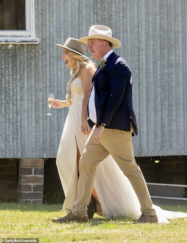 Vikki Campion wore a strapless cream dress with black cowboy style boots (pictured)