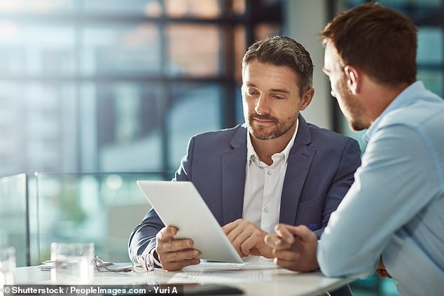 Finance professions such as management consultants and accountants were rated as the professions most likely to be replaced by AI (stock image)