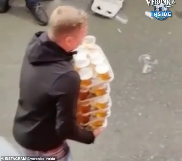 Carrying huge amounts of beer has become a point of pride for Twente fans