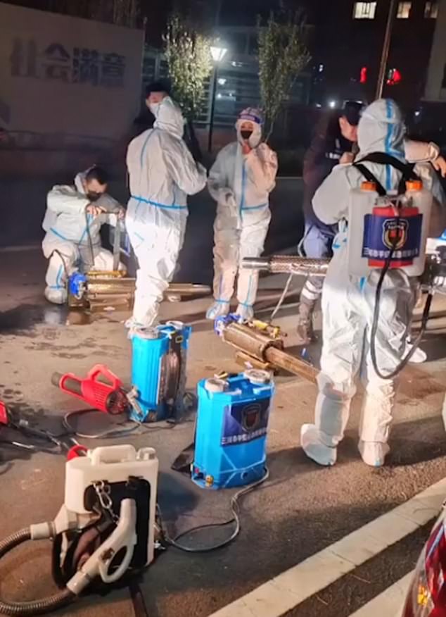 Images have emerged of workers in Hazmat suits spraying classrooms, reportedly in the city of Sanhe, about 40 miles east of Beijing.  It was posted by New York activists who said the images were recent