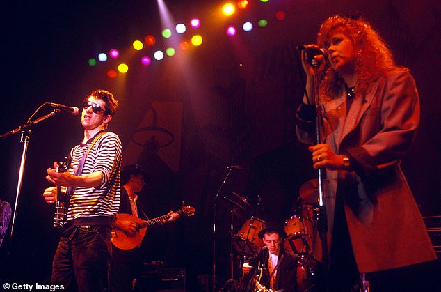 Shane MacGowan of the Pogues performs with Kirsty Maccoll