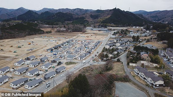 The aerial photo shows the construction of social housing in Okawara district, where the government lifted a mandatory evacuation order in 2019