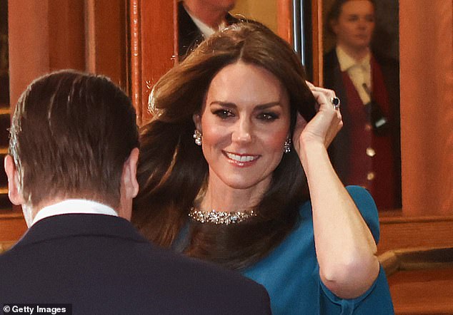 Kate looked elegant despite what was likely a bitterly cold gust of wind as she braved the freezing temperatures