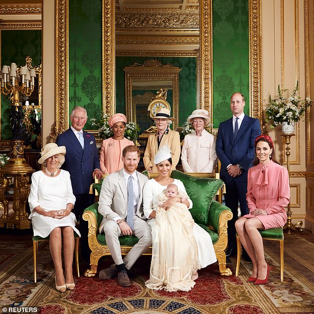 Prince Archie is pictured with his parents at his christening in this official photo taken in July 2019