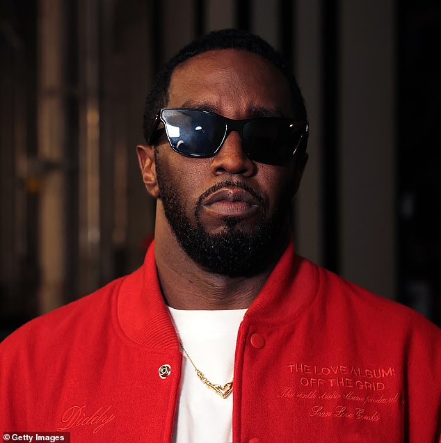 Double collusion: Woman claims she and a friend went to Aaron Hall's house after a record label party, where Diddy and Hall took turns raping her;  seen on September 15 in NYC