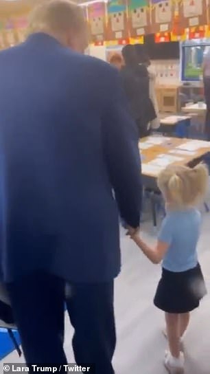 Donald Trump's 4-year-old granddaughter rushed to show him her classroom desk as he went to her school on Grandparents Day