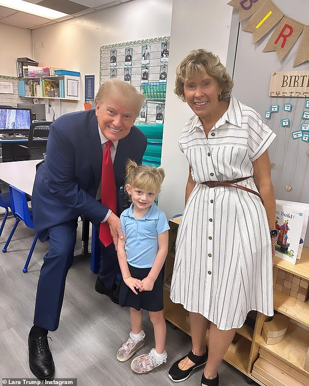 Former President Donald Trump pictured with his granddaughter Carolina and her teacher on Grandparents Day