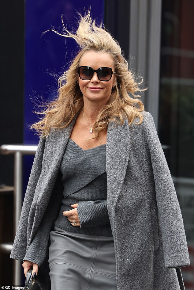 On the road: Amanda Holden was left in an uproar as she left the Heart Radio studios with her co-host Ashley Roberts on Wednesday