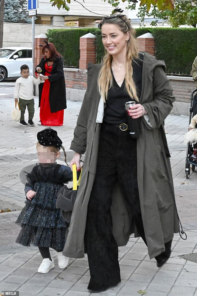 Halloween outing: Amber Heard celebrated Halloween with her daughter Oonagh in Spain on Tuesday.  The Aquaman actress, 37, was spotted getting into the holiday spirit as she went trick-or-treating and playing in the park with her two-year-old daughter in costume