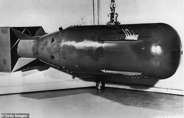 The uranium-based atomic bomb, called 'Little Boy', was dropped on Hiroshima, where 320,000 people lived when it was released in 1945.  Pictured is a post-war replica of the bomb