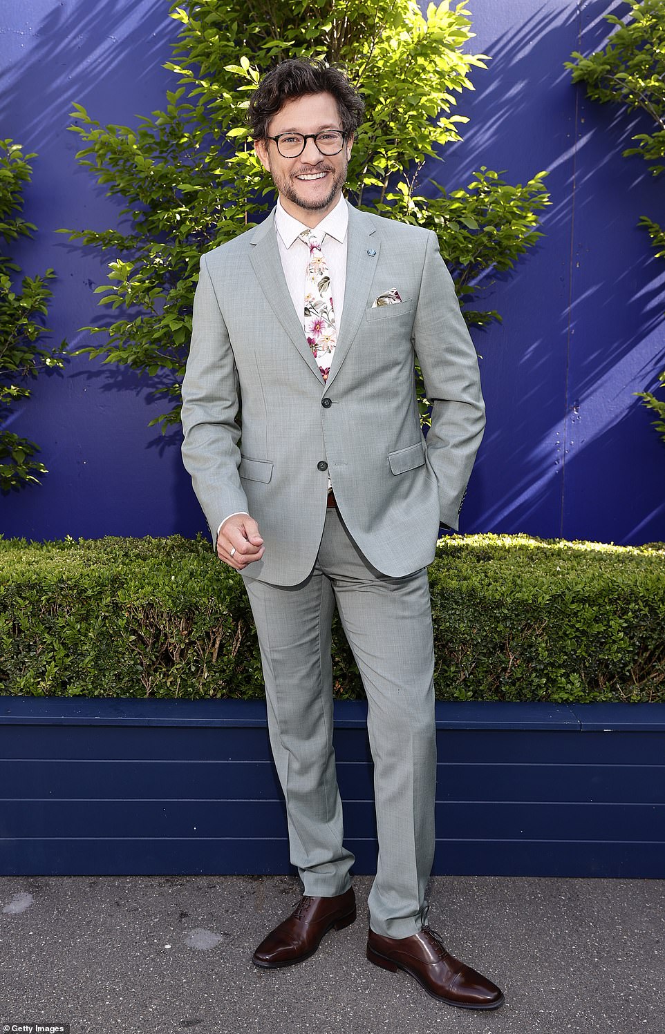 Joining her in the Birdcage was actor Rob Mills, whose combination of gray suit and floral tie put him in the running for best-dressed male racegoer