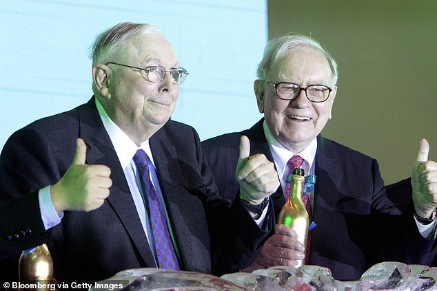 Investment titan Charlie Munger (left), the longtime business partner of Warren Buffett (right), died Tuesday at the age of 99