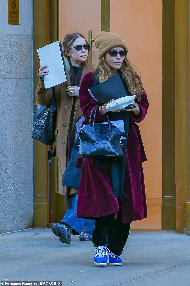 Spotted: Ashley Olsen (left) enjoyed a rare outing with her twin sister Mary-Kate in New York City on Thursday
