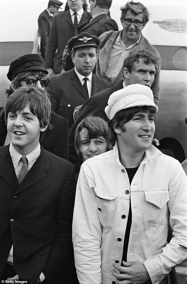 Mal Evans (above right) pictured with the Beatles at London Heathrow Airport in July 1965. Mal had left his job as a telephone engineer to work as a roadie for the Beatles in the summer of 1963