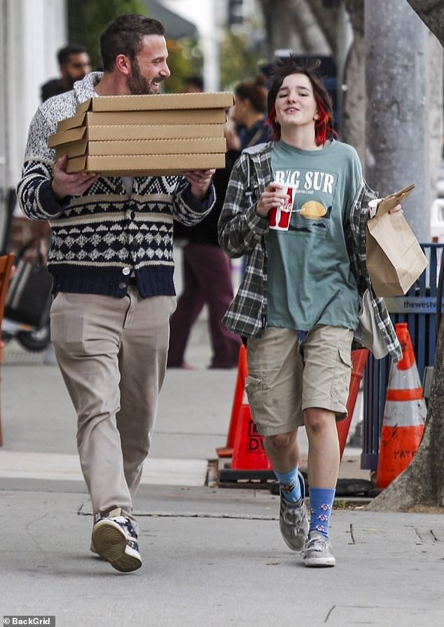 Quality time: The father-daughter duo browsed a bookstore before grabbing five pizzas and heading home