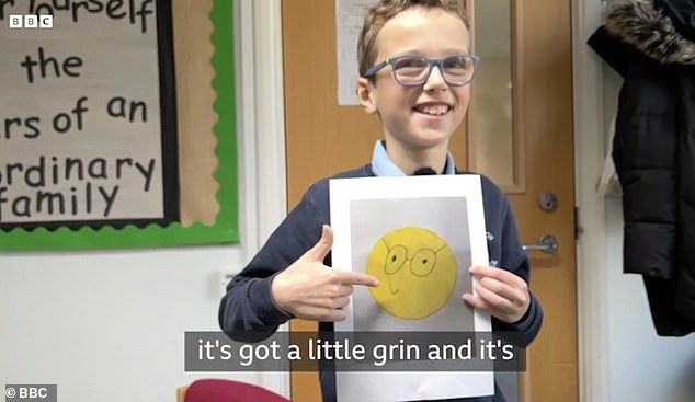 The bespectacled schoolboy created his own version of the emoji, replacing the toothy smiley with a small smiley