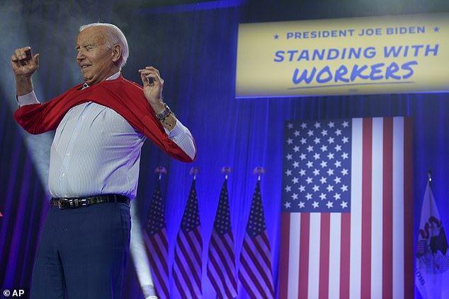 President Joe Biden dons a United Auto Workers t-shirt