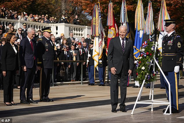 After laying a ceremonial wreath, Biden appeared to need direction from a military officer as he took steps in the wrong direction